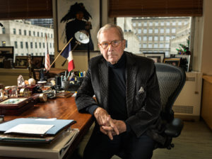 Tom Brokaw at desk
