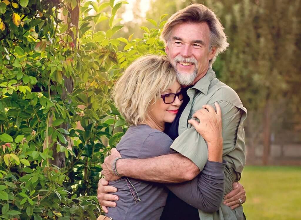 Love Conquers All How Olivia Newton Johns Second Marriage Gives Her