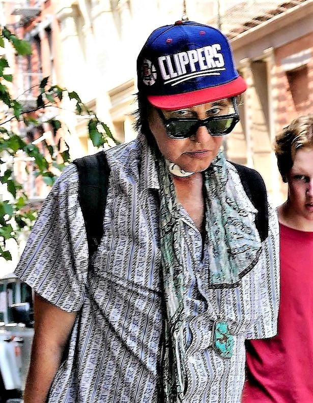 Kilmer was spotted in New York City with his Clippers hat, a patterned shirt, and what looks to be a tracheostomy device left from his throat cancer surgery