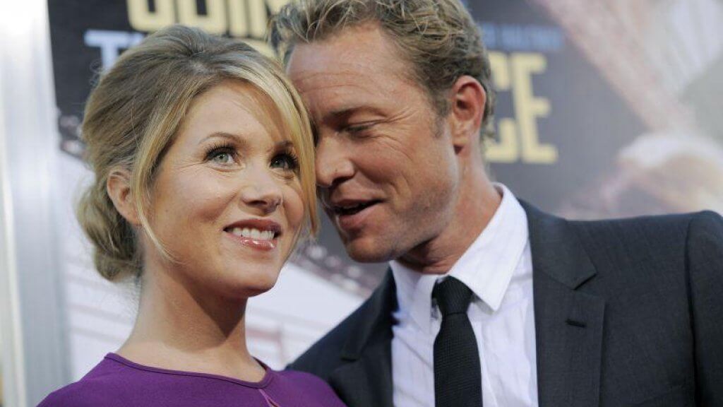 Christina Applegate smiling in a photo alongside her husband Martyn LeNoble