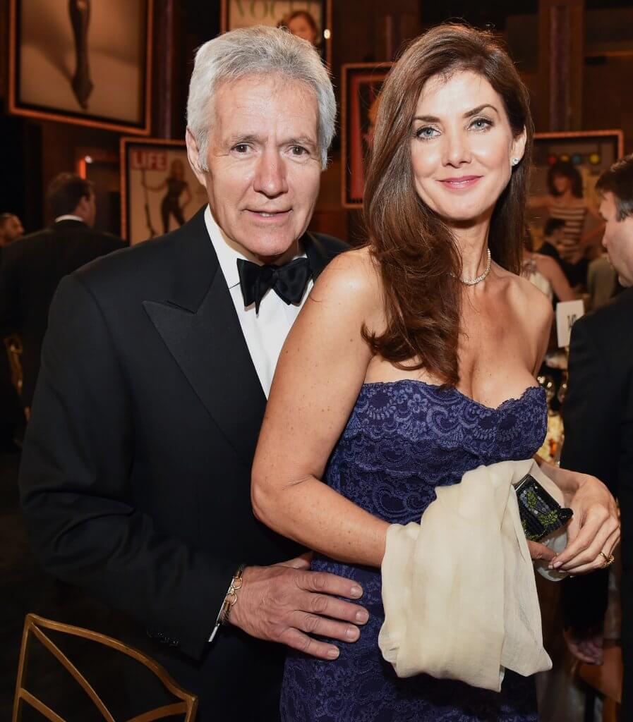Jean and Alex Trebek posing at an event