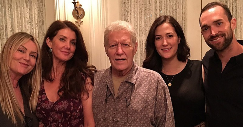 Alex Trebek posing with his wife Jean Trebek and his three kids