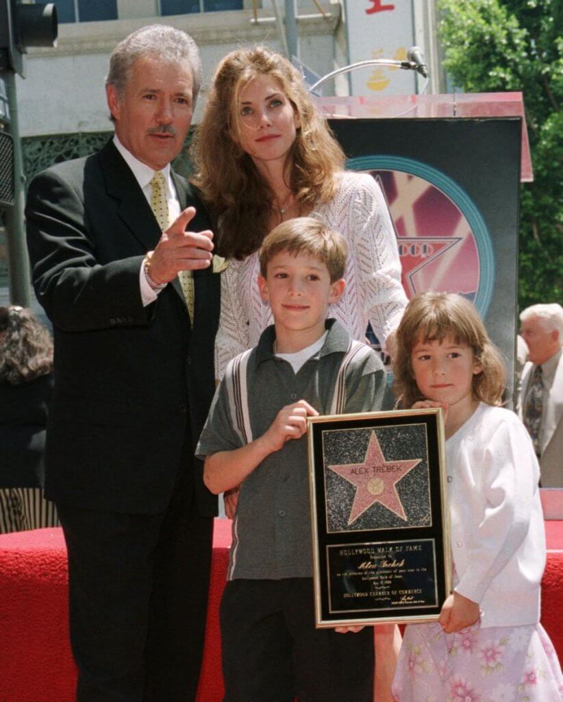 Alex and Jean Trebek posing with Hollywood star Wall of Fame with children Erin and Matthew Trebek