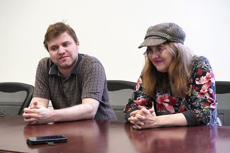 Alex Trebek fan Michael Kneeter and his mother, Debbie Stevens, playing the voicemail from Alex Trebek