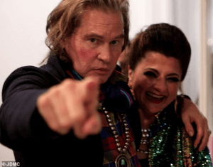 Val Kilmer looked lively and energetic posing with artist Tamie Adaya at his HelMel studio in Los Angeles