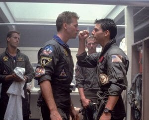 Val Kilmer and Tom Cruise in 1986 portraying their characters as Navy Fighter Pilots in Top Gun