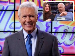 Alex Trebek smiling as he hosts Jeopardy