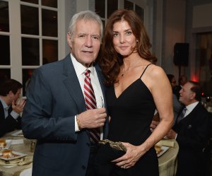 Alex and Jean Trebek posing at a dinner event