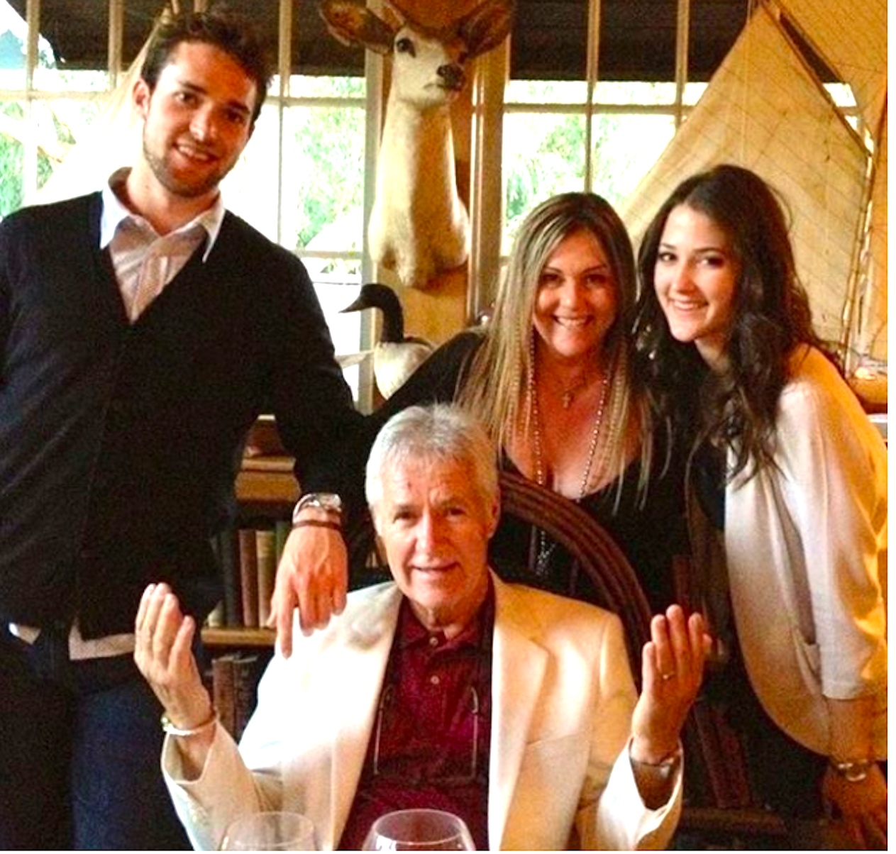 Alex Trebek is pictured having a father's day dinner with his children in their home