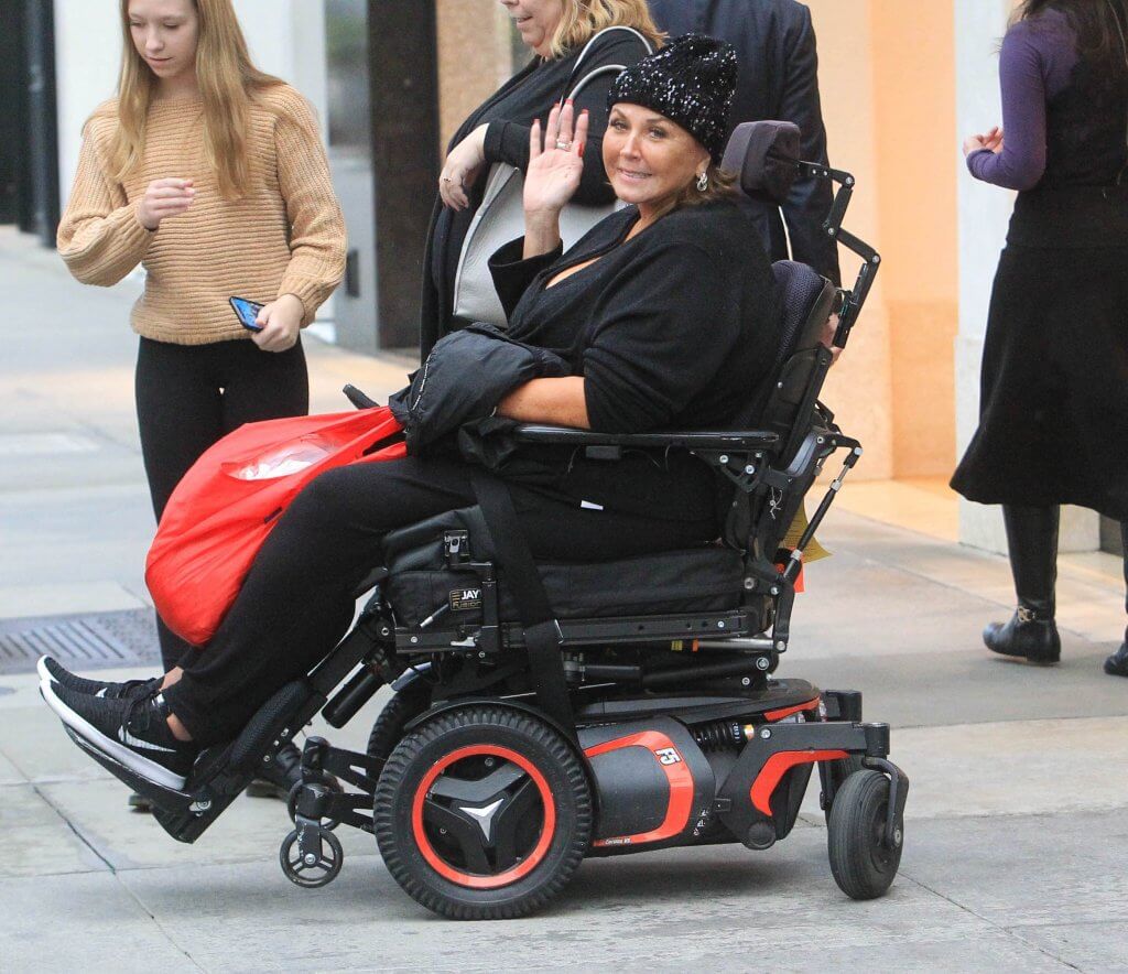 Why is Abby Lee Miller using a wheelchair?