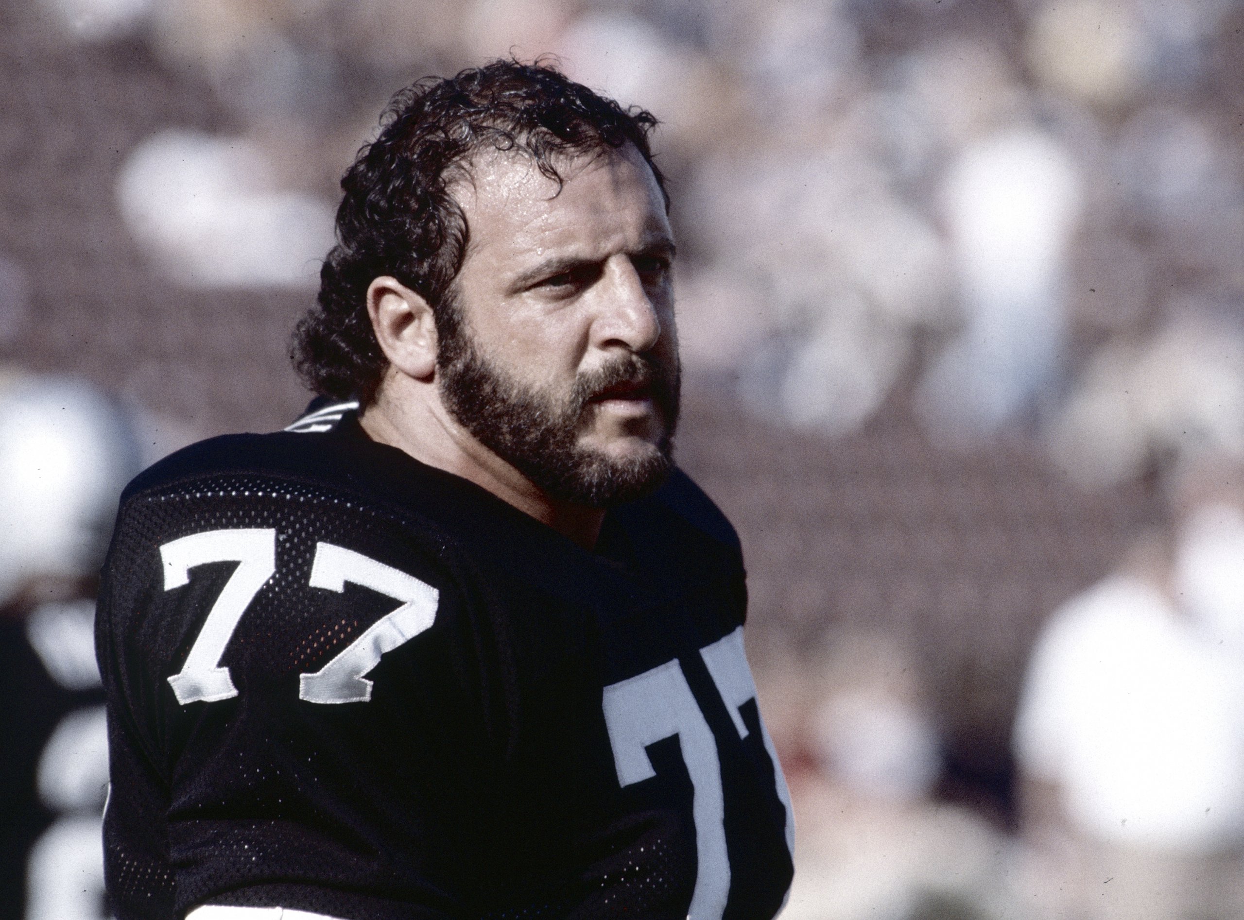 Lyle Alzado of the Denver Broncos looks on from the bench during an News  Photo - Getty Images