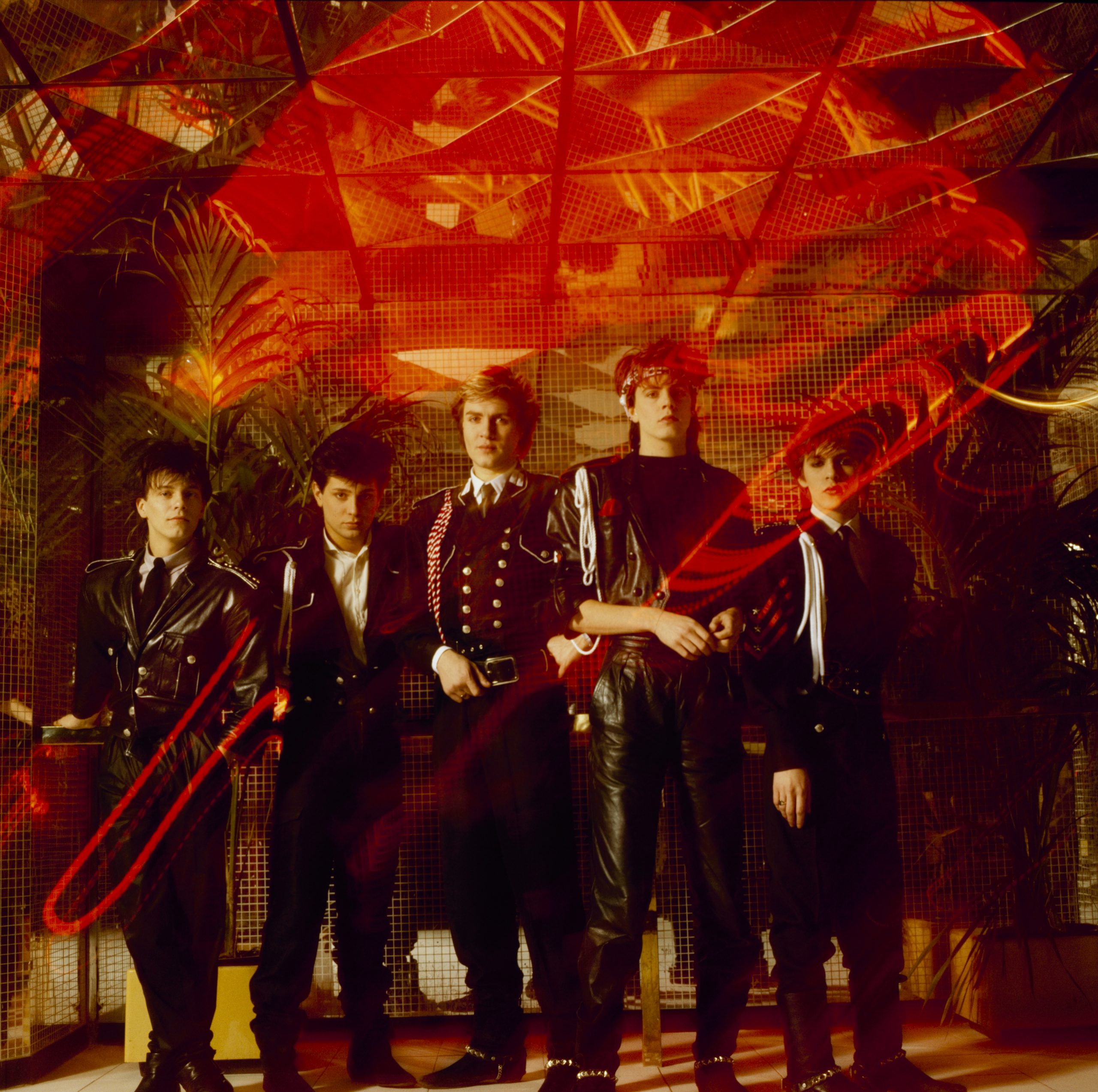 UNITED KINGDOM - JANUARY 01: Posed group portrait of British band Duran Duran. Left to right are Andy Taylor, Roger Taylor, Simon Le Bon, John Taylor and Nick Rhodes in 1983. (Photo by Fin Costello/Redferns)