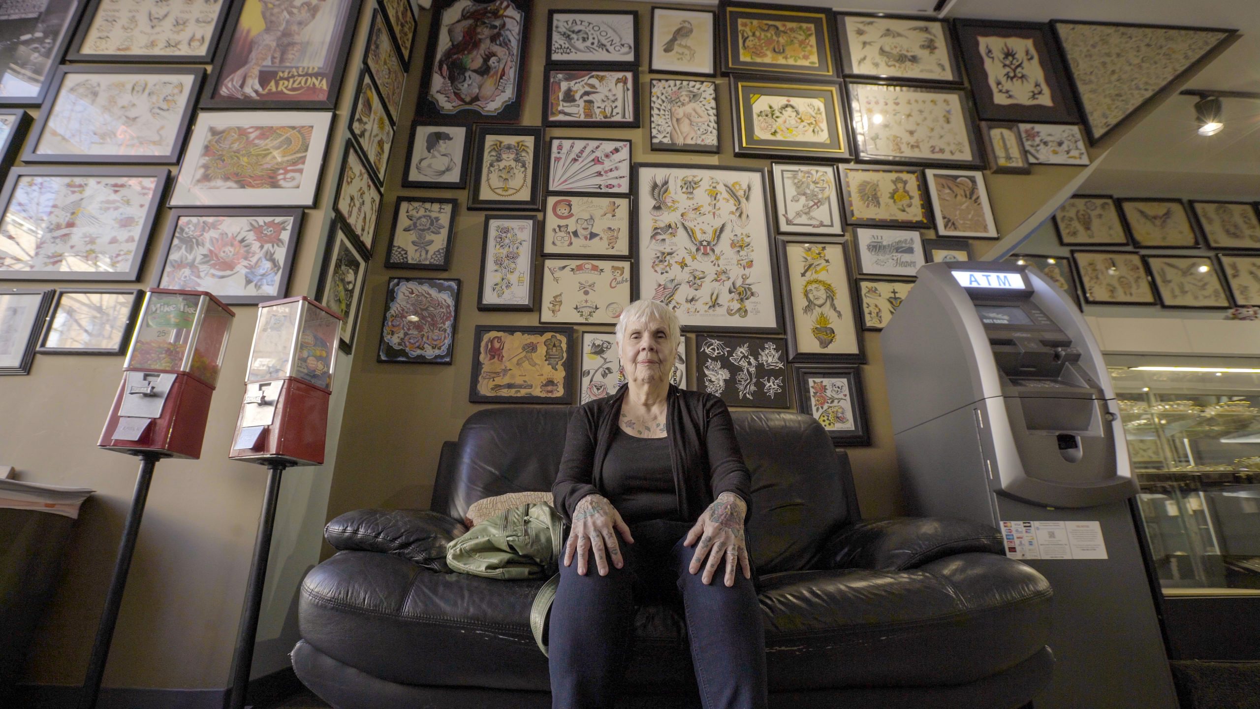 Helen Lambin sits in a tattoo shop in the film "Radical Age."