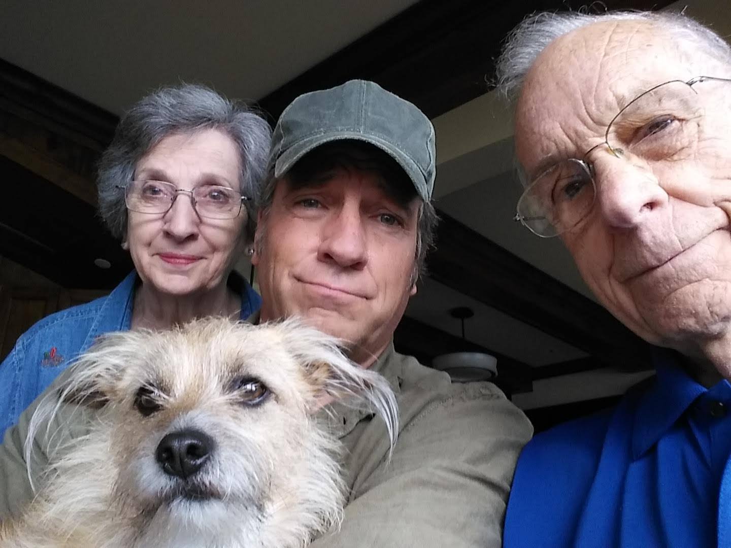 "Dirty Jobs" star Mike Rowe with his mom, Peggy Rowe (left), and his dad, John Rowe (right). (Mike Rowe/Facebook)
