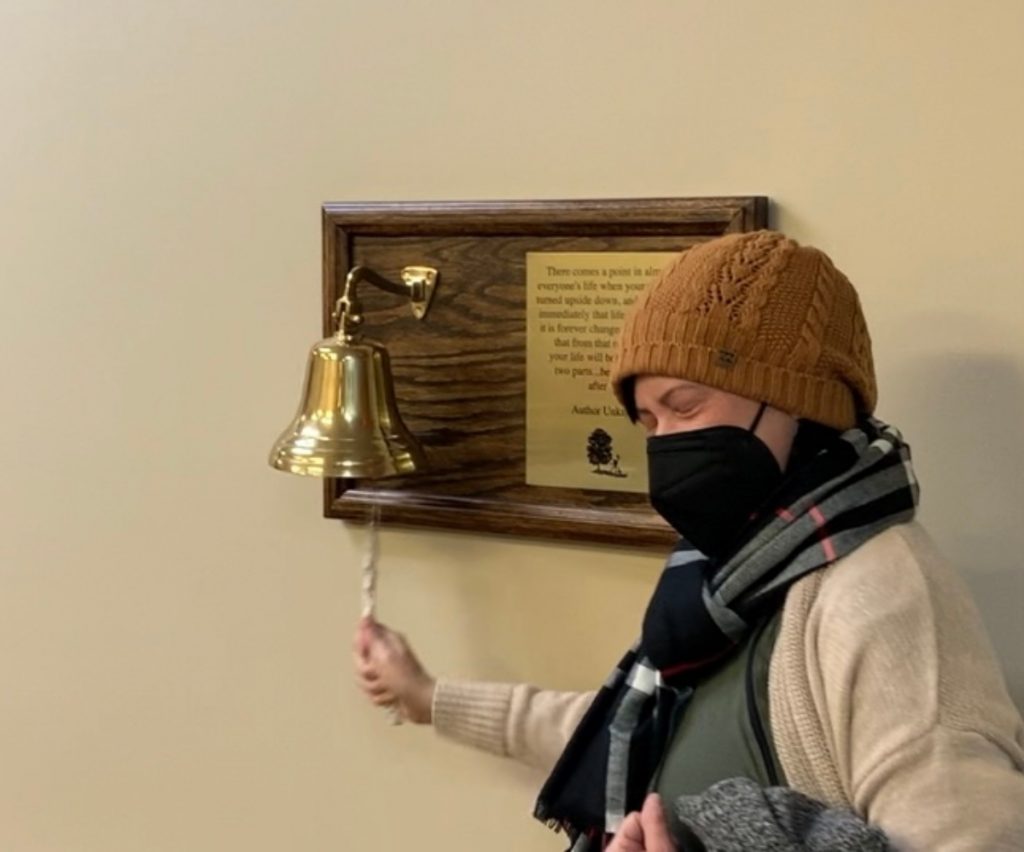 Breast cancer survivor Jamie Cooper rings the bell to celebrate the end of her treatment (Photo: Jamie Cooper)